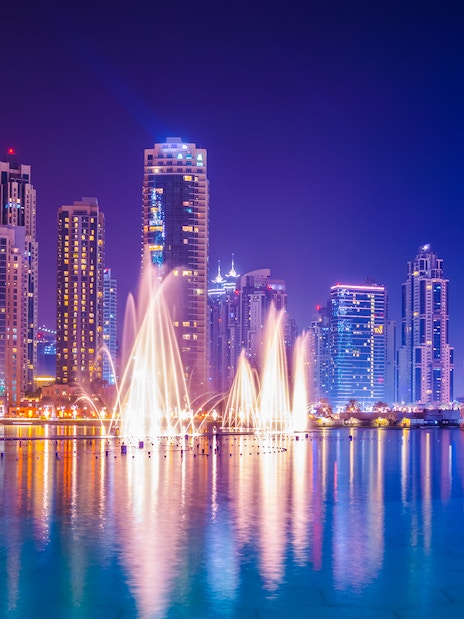 Dancing water fountain show with Dubai skyline during 2-hour luxury dhow dinner cruise.