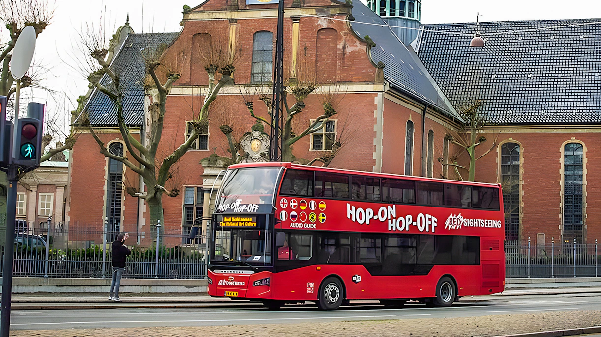 https://cdn-imgix.headout.com/media/images/a09cdd720e07c5616a88859a2eab21ca-28443-copenhagen-red-sightseeing--copenhagen-hop-on-hop-off-bus-tour-with-optional-boat-tour-03.jpg