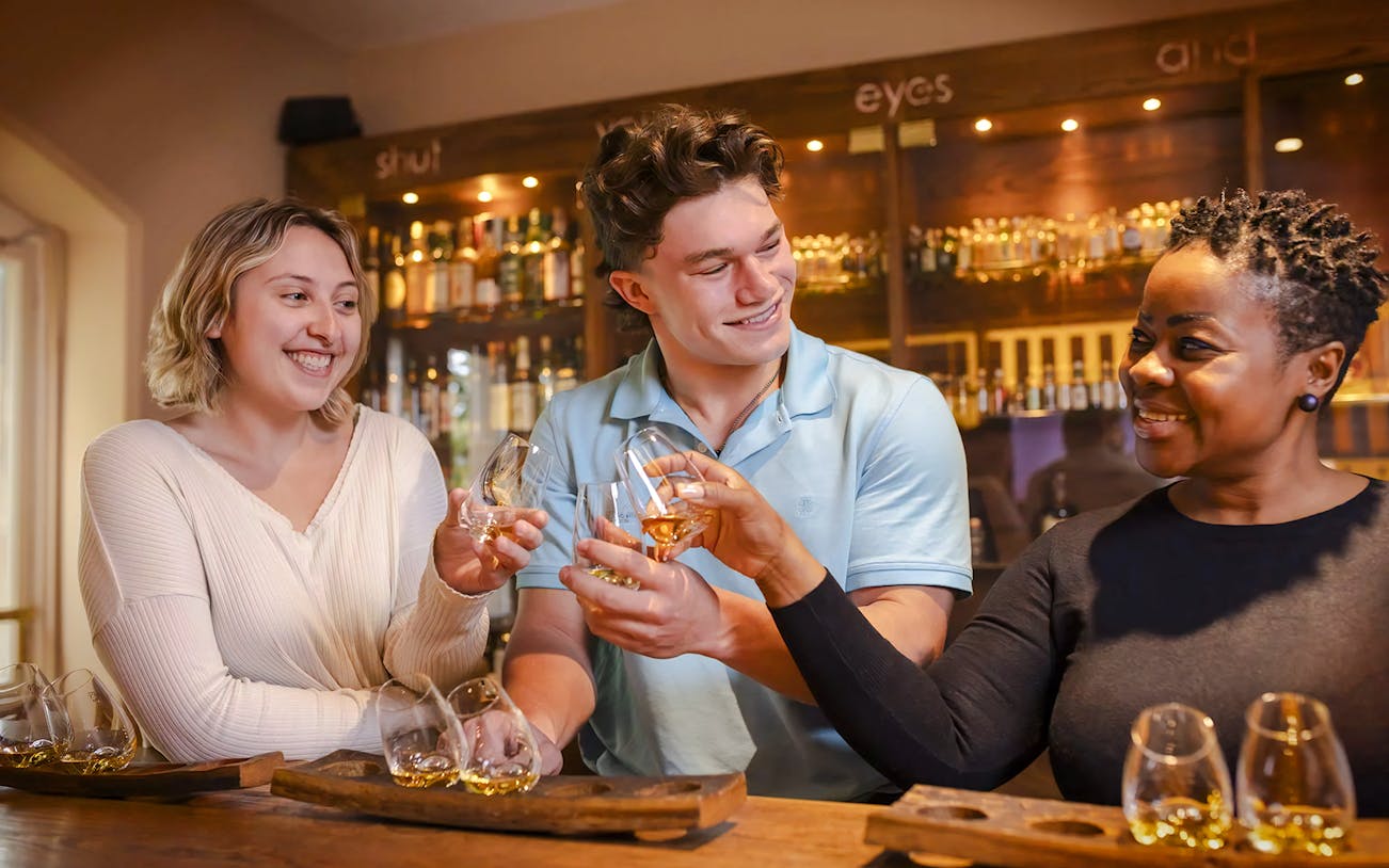 Guests enjoying whiskey tasting at the Irish Whiskey Museum.