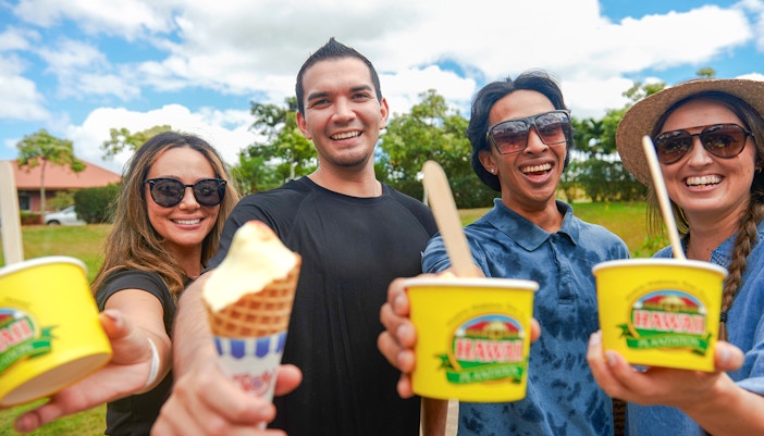 Friends enjoying ice cream during Oahu's Grand Circle tour.