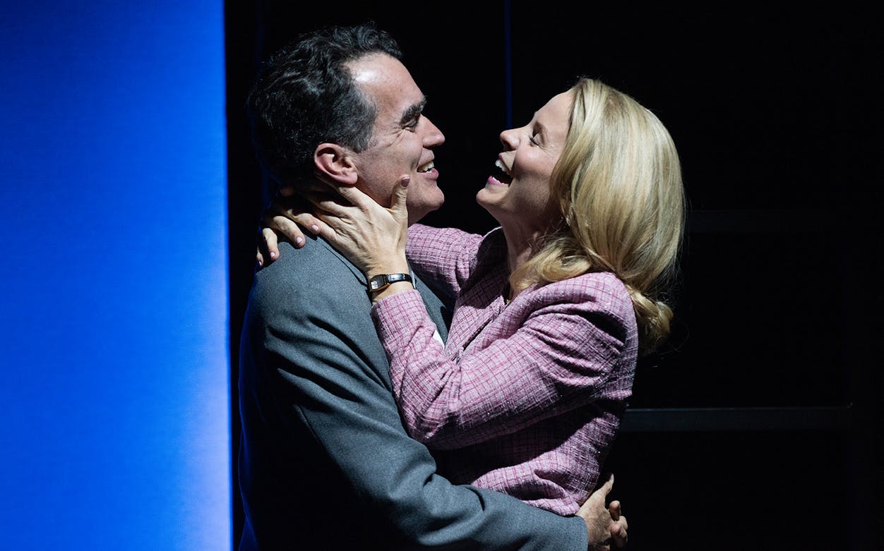 Couple embracing on stage during "Days of Wine and Roses" performance.