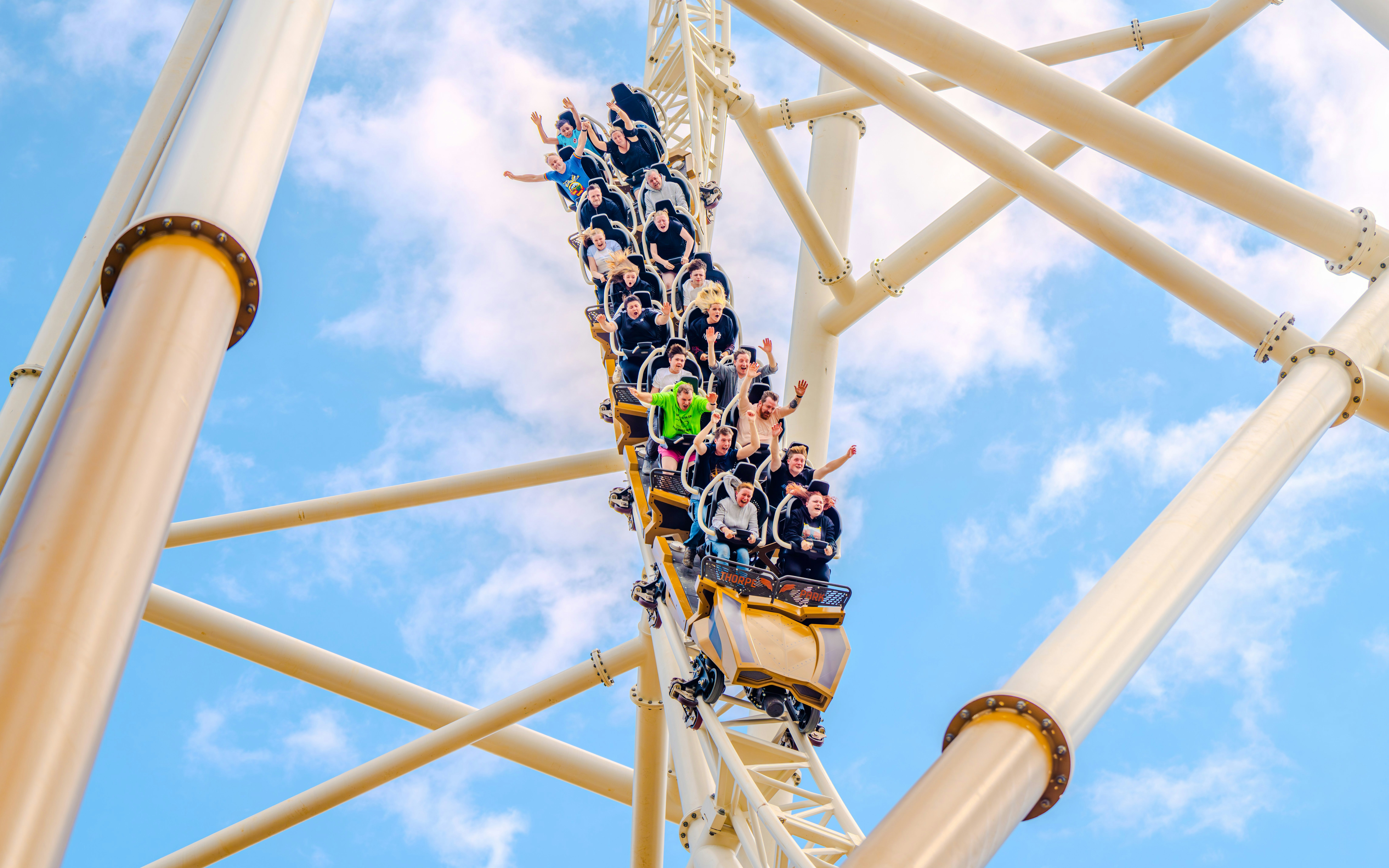 Visitors enjoying the Hyperia ride at Thorpe Park, London.
