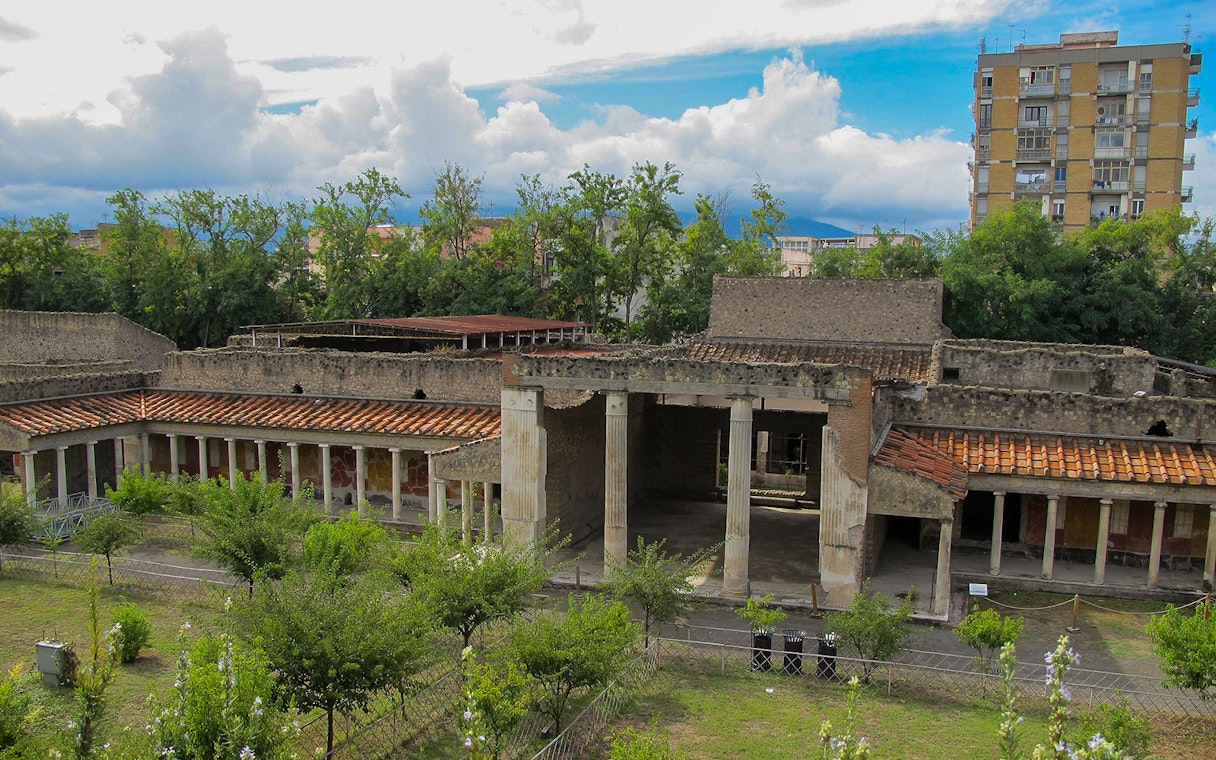 Oplontis ruins with columns and greenery in Torre Annunziata, Italy.