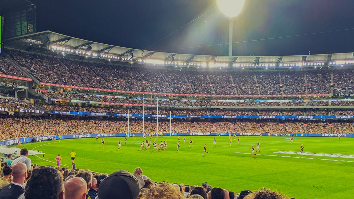 Spectators watching a match at Melbourne Cricket Ground
