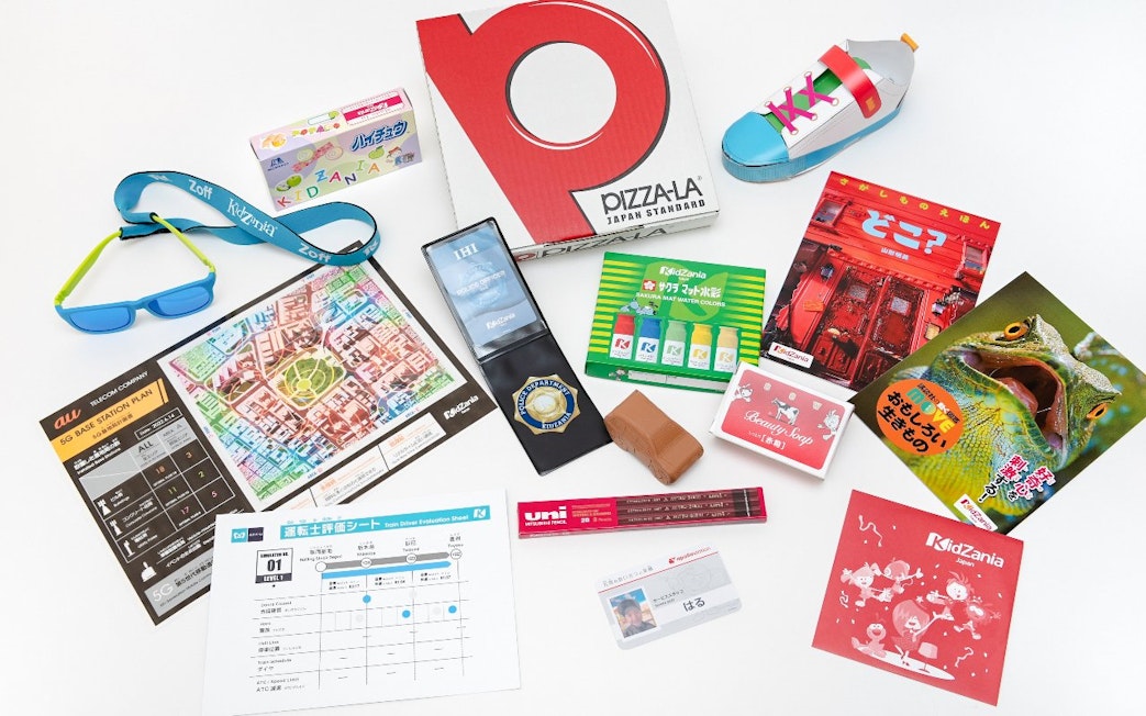 Stationery items and promotional materials from KidZania Tokyo.