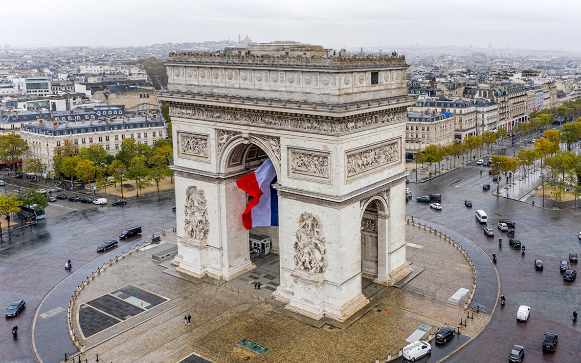 Arc de Triomphe with view of Champs-Élysées in Paris, France.