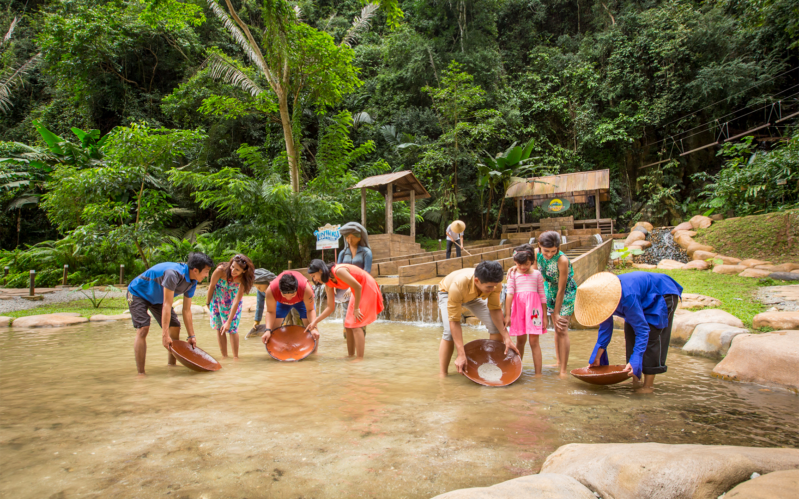 Visitors panning for gold at Sunway Lagoon Theme Park, Malaysia.