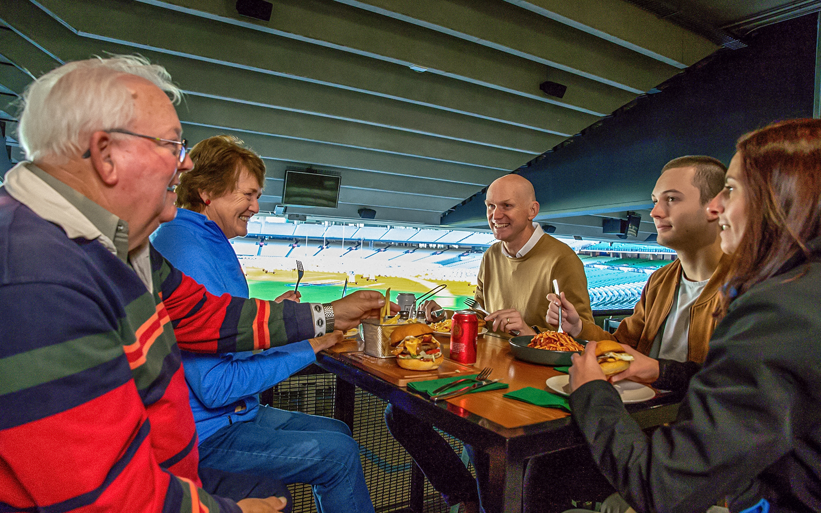 Group dining at Melbourne Cricket Ground during Sports Lovers Day Tour.