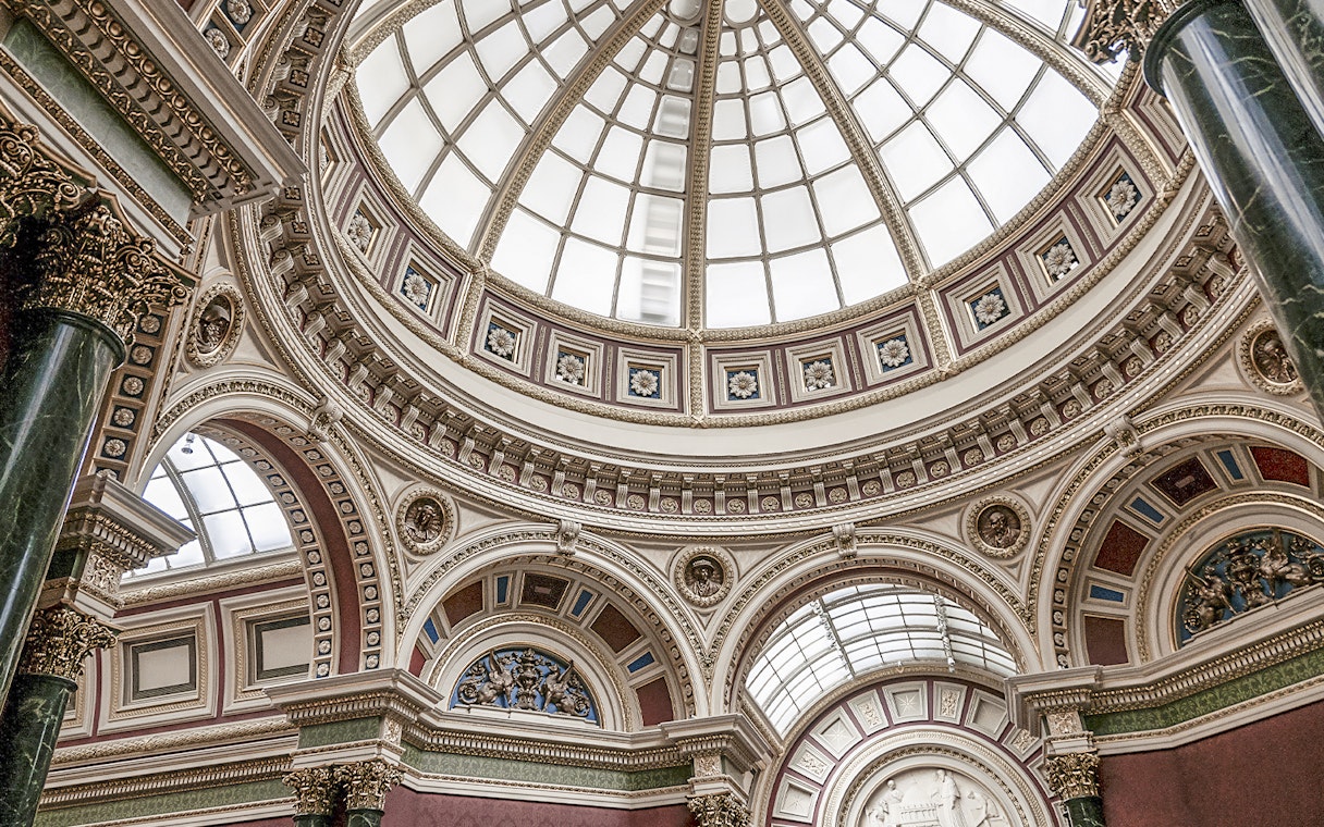 Dome interior of the National Gallery, London, showcasing ornate architectural details.