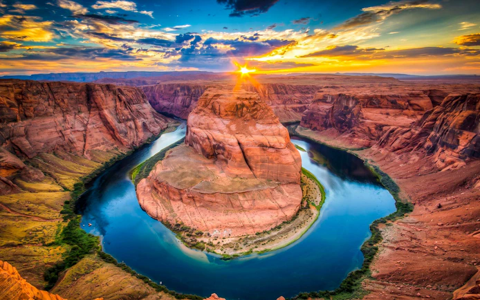Horseshoe Bend at sunset with Colorado River, part of Antelope Canyon tour.
