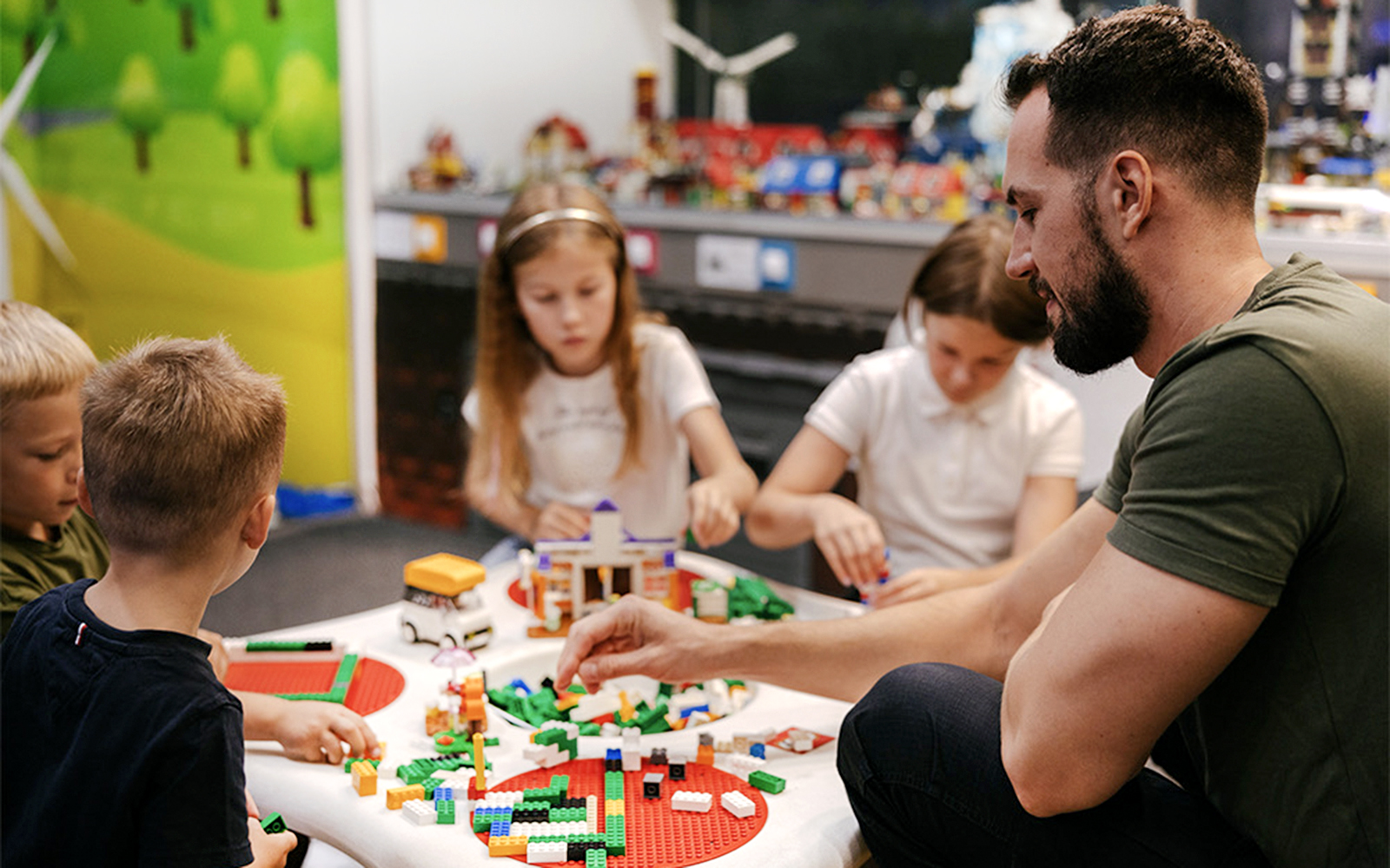 Children building with bricks at Museum of Bricks exhibit.