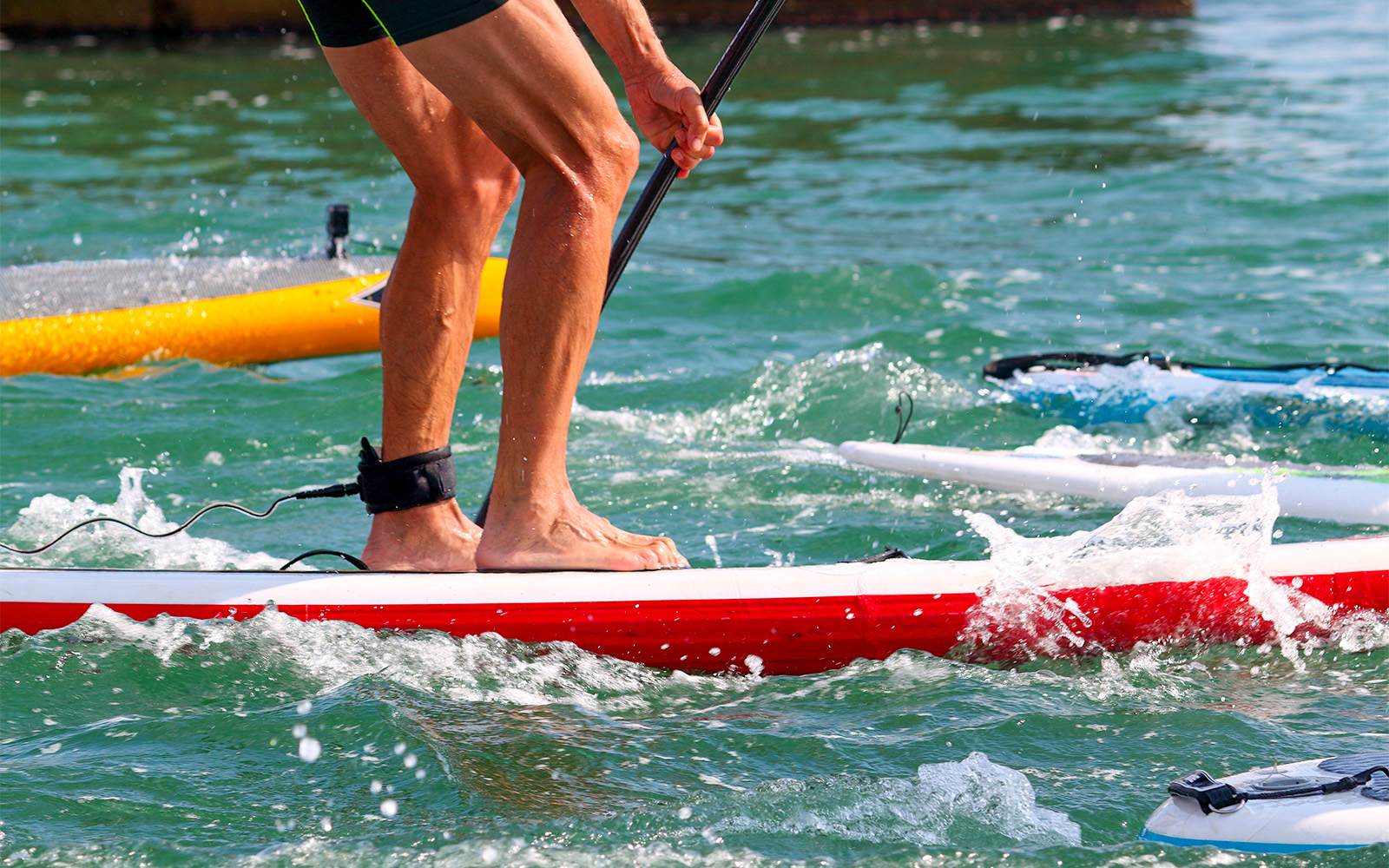 Stand-up paddleboarding at Siloso Beach, Sentosa Island, near Ola Beach Club.