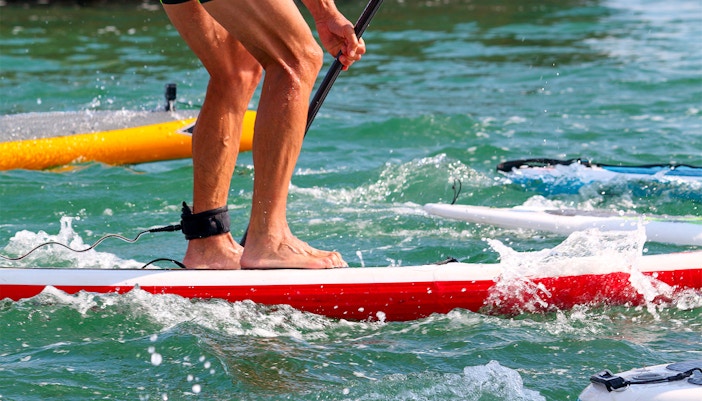 Stand-up paddleboarding at Siloso Beach, Sentosa Island, near Ola Beach Club.
