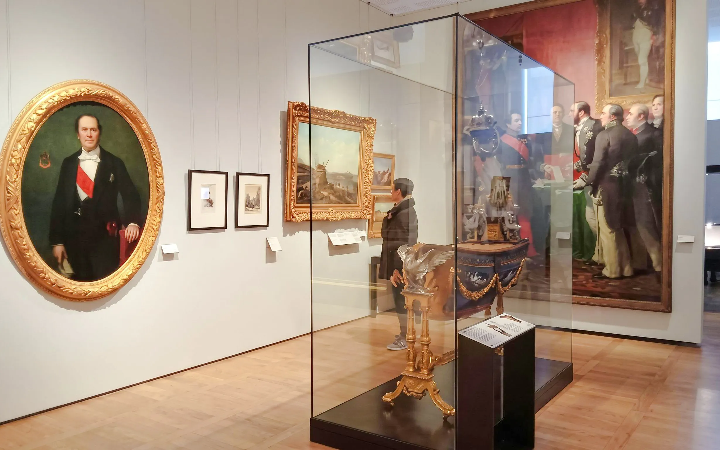 Carnavalet Museum gallery with historical paintings and artifacts on display.