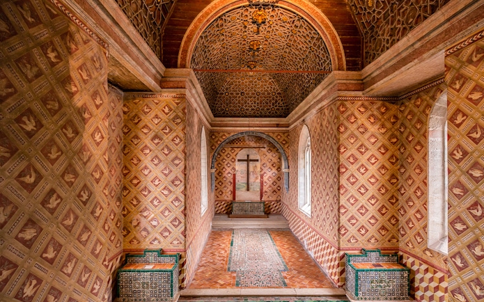 Palatine Chapel interior with intricate patterned walls and ceiling, Sintra Palace, Portugal.