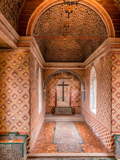 Palatine Chapel interior with intricate patterned walls and ceiling, Sintra Palace, Portugal.