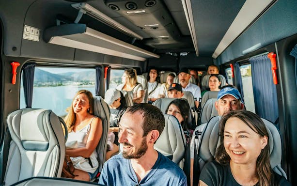 Tour group enjoying a scenic drive to the Temple of Poseidon, Cape Sounion.