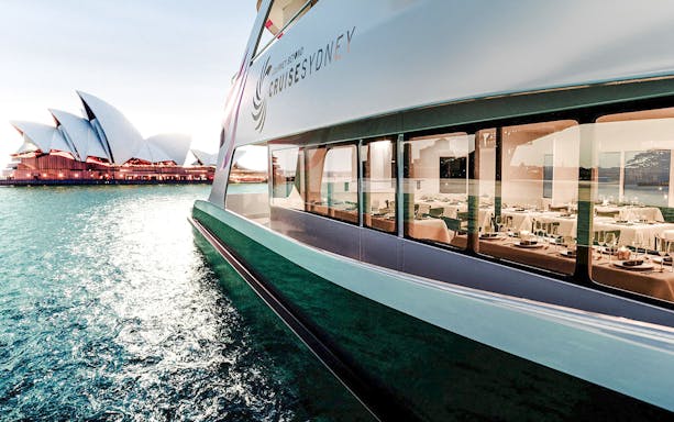 Cruise ship sailing past Sydney Opera House, Journey Beyond Cruise Sydney.