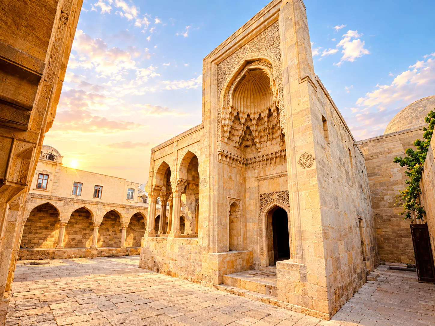 Palace of the Shirvanshahs courtyard with intricate stone arches, Baku.