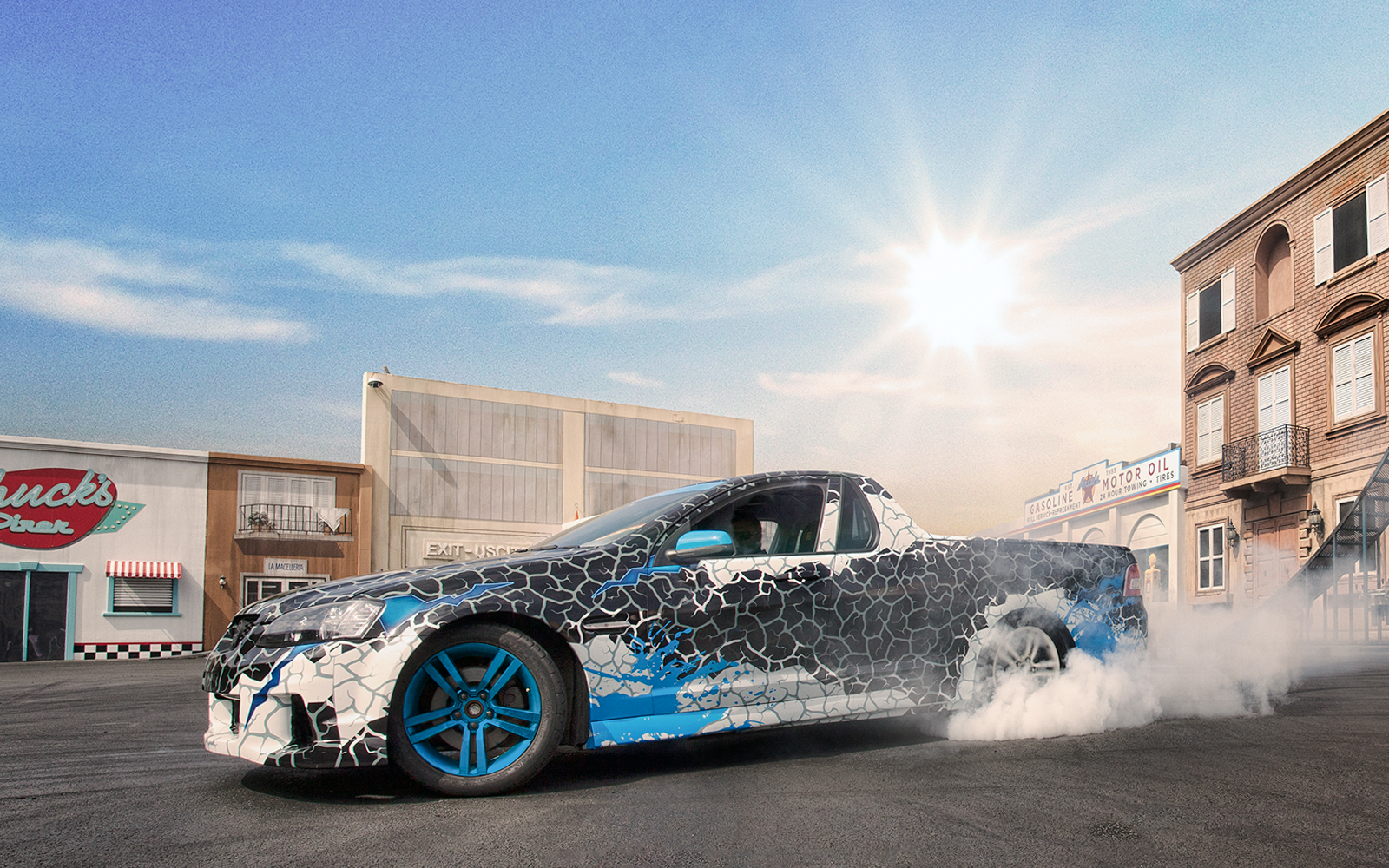 Stunt driver performing a thrilling car chase scene at a live show, a unique experience for adrenaline junkies