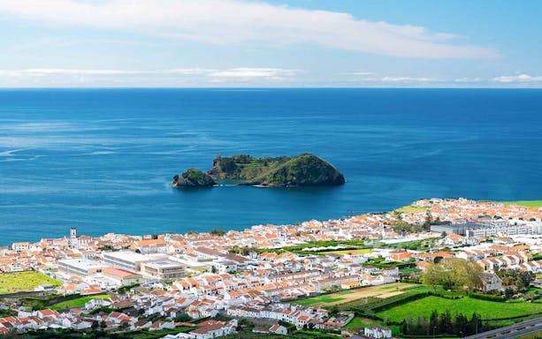 São Miguel coastline with islet view, ideal for glass bottom boat tours.