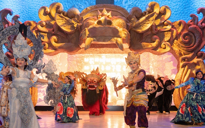 Balinese dancers performing at Garuda Wisnu Kencana at night.