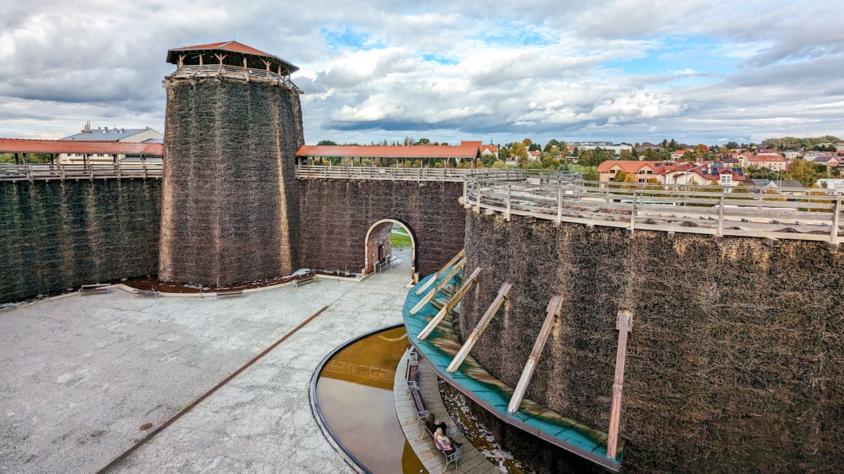Brine Graduation Tower in Wieliczka with cascading saltwater over wooden structures.
