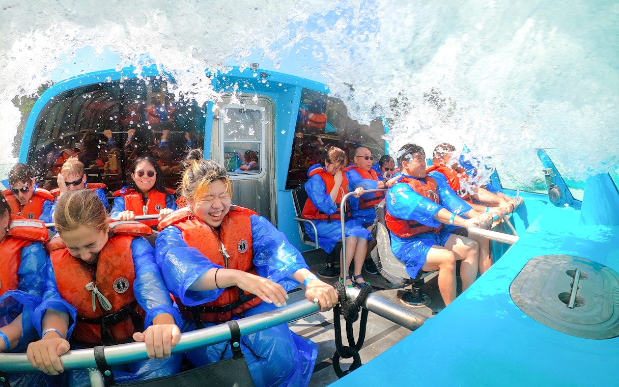 Guests enjoying the Freedom jet boat tour in Niagara River Gorge, Canada.