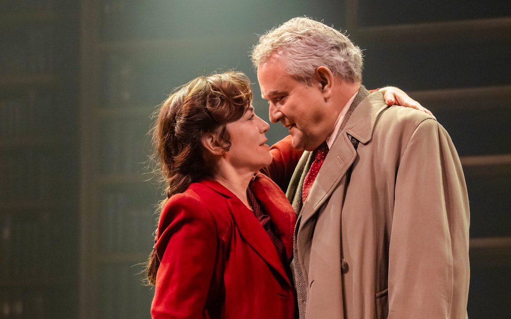 Stage scene from Shadowlands, Westend, featuring two actors in an emotional embrace.