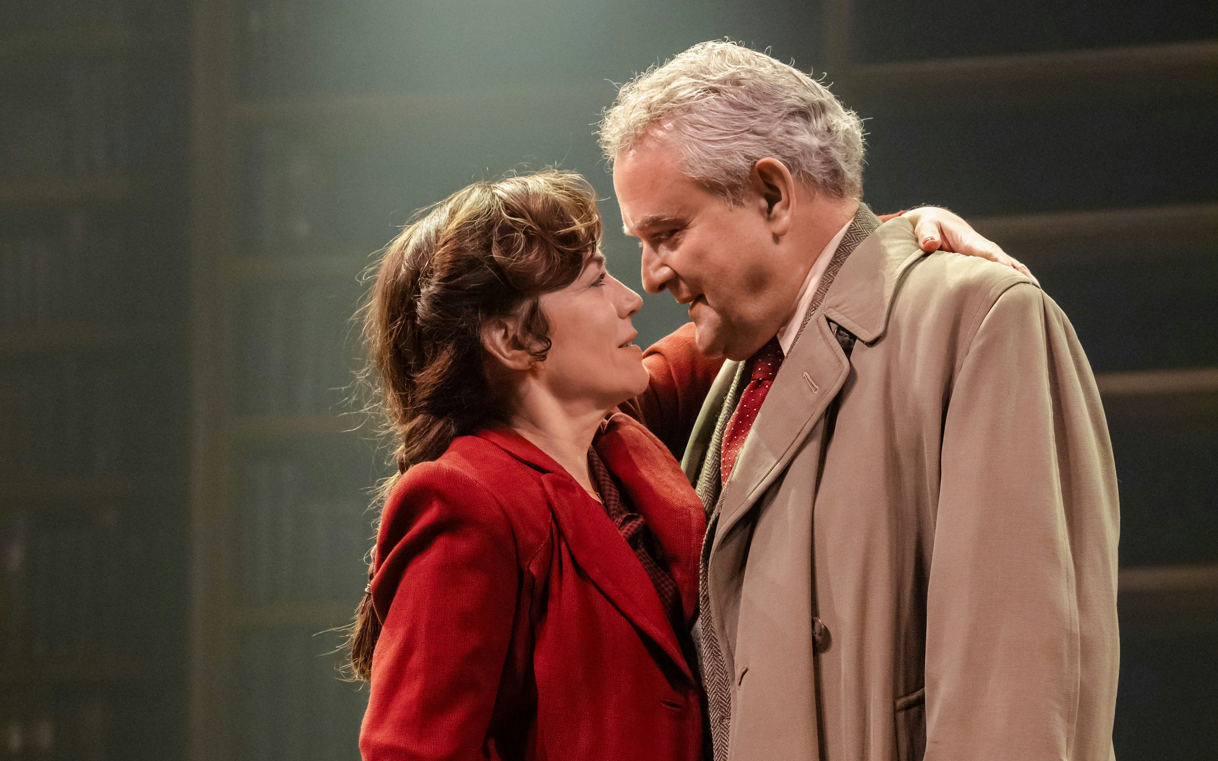 Stage scene from Shadowlands, Westend, featuring two actors in an emotional embrace.