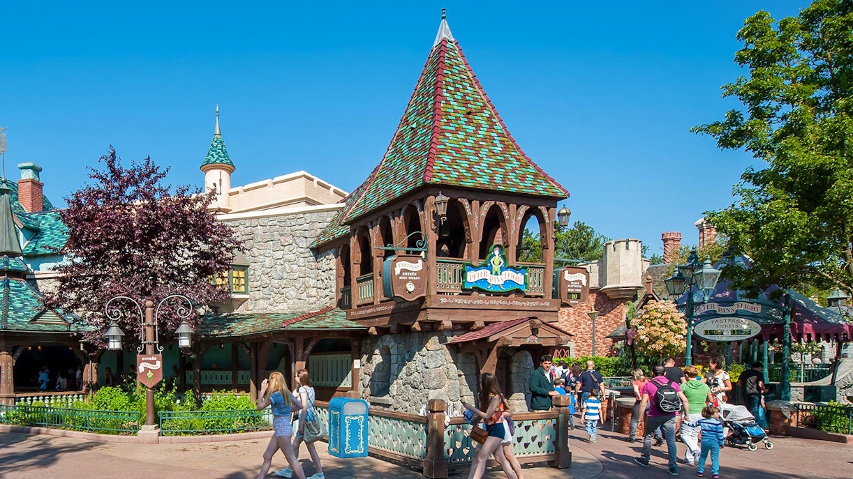Peter Pan's Flight ride at Disneyland Paris with flying pirate ship over London scene.