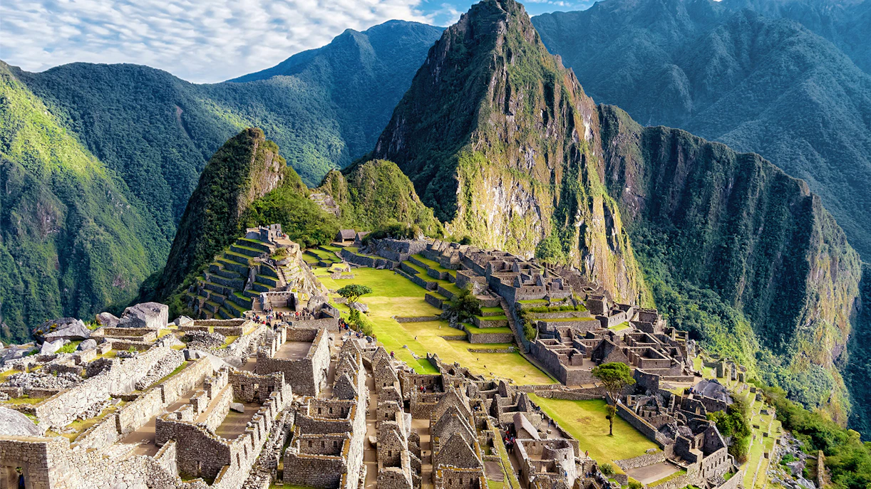 Machu Picchu ruins with Huayna Picchu mountain in the background, Peru.