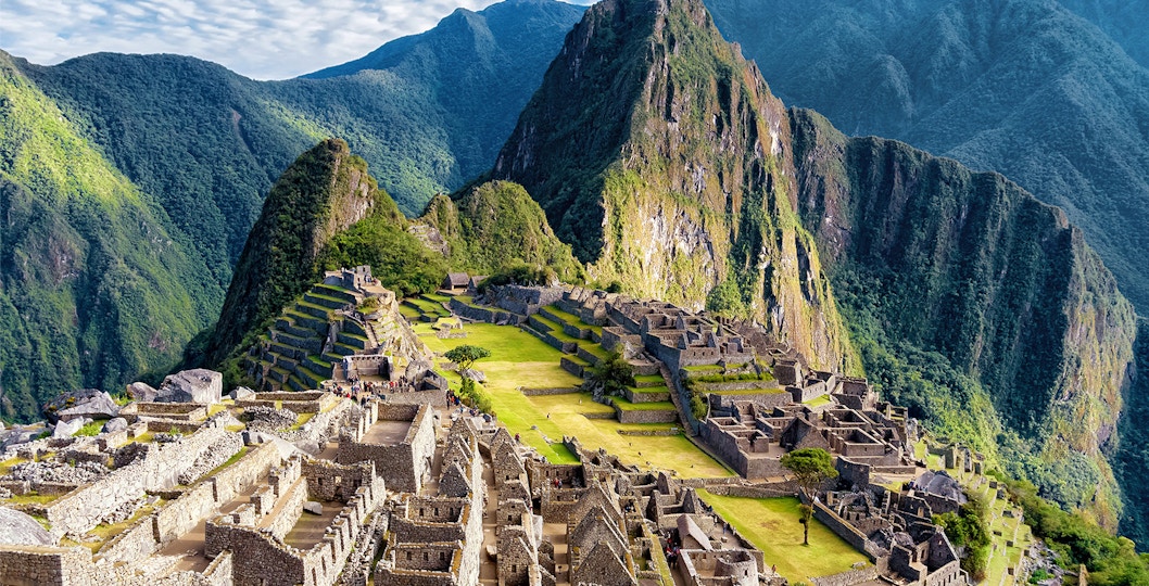 Machu Picchu ruins with Huayna Picchu mountain in the background, Peru.