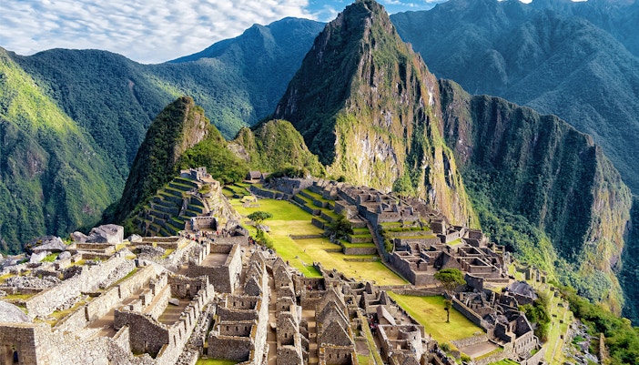 Machu Picchu ruins with Huayna Picchu mountain in the background, Peru.