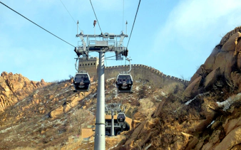 Cable cars ascending near the Badaling section of the Great Wall, China.