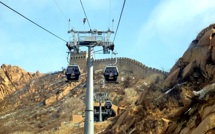 Cable cars ascending near the Badaling section of the Great Wall, China.