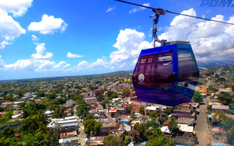Cable car over Santo Domingo cityscape, part of the Santo Domingo Private City Tour.
