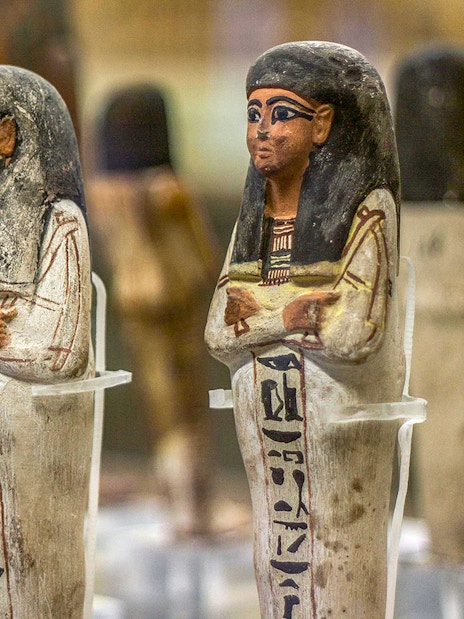 Ancient Egyptian figurines displayed at the National Museum of Egyptian Civilization in Cairo.