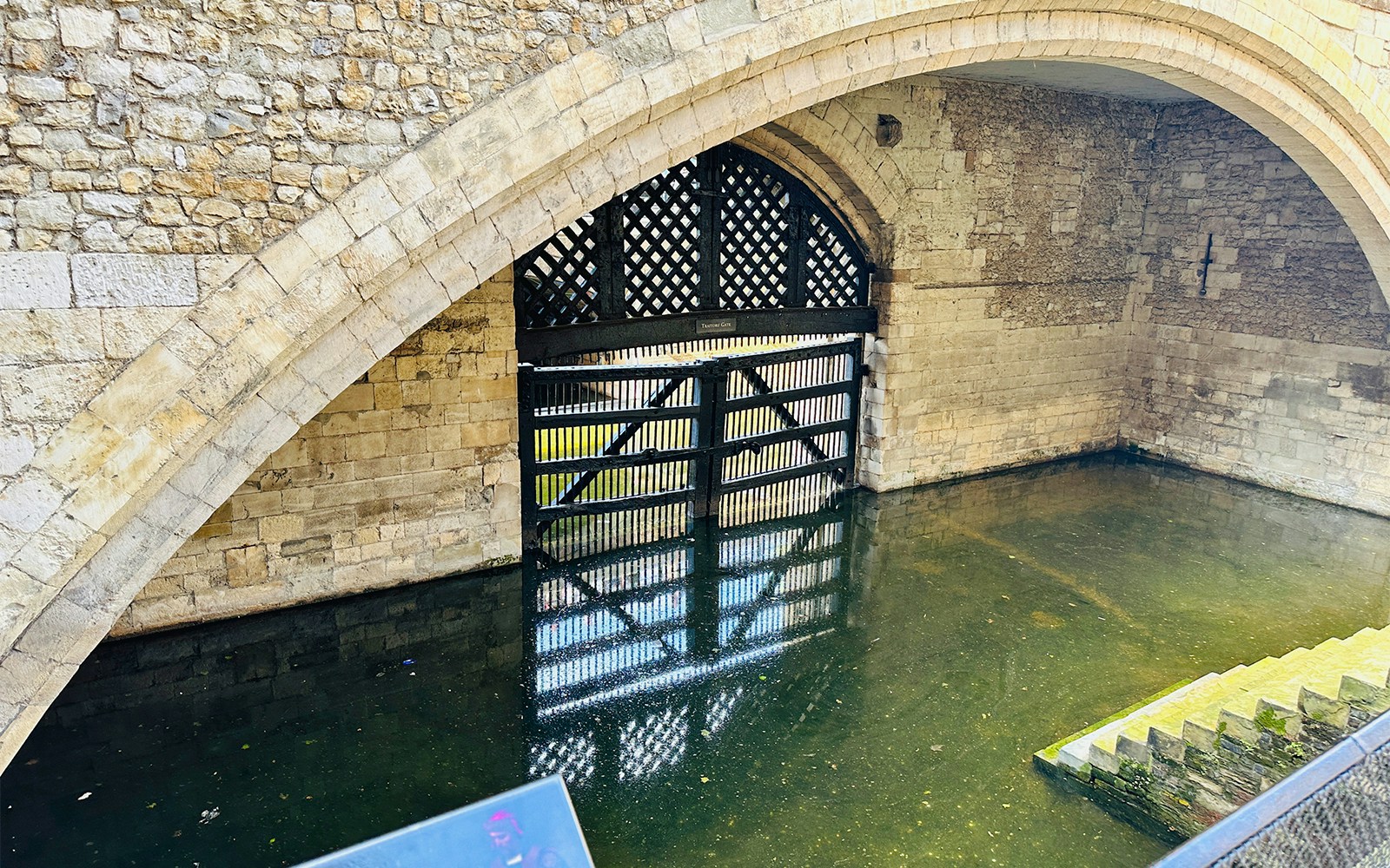 Traitor's Gate at the Tower of London with water reflection.