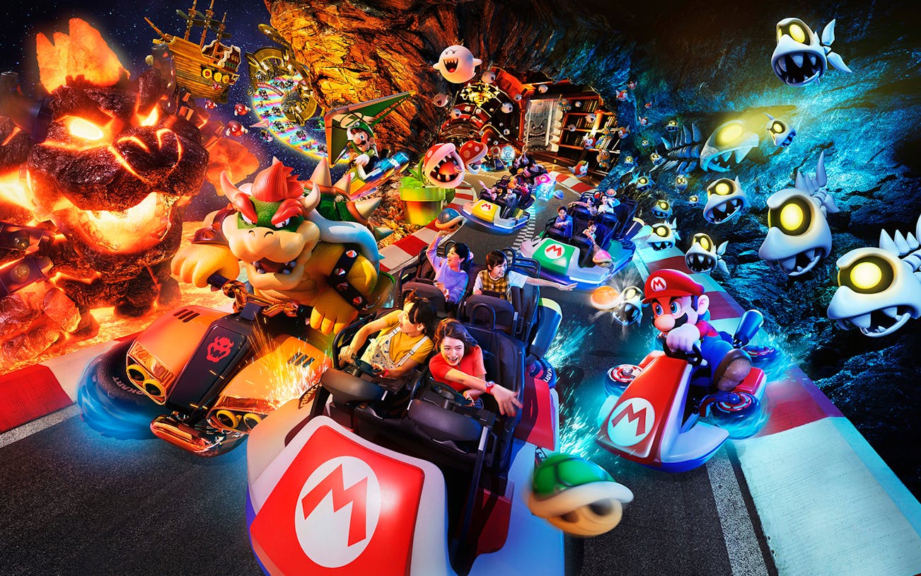Visitors enjoying Mario Kart ride at Universal Studios Japan with Express Pass for priority access.
