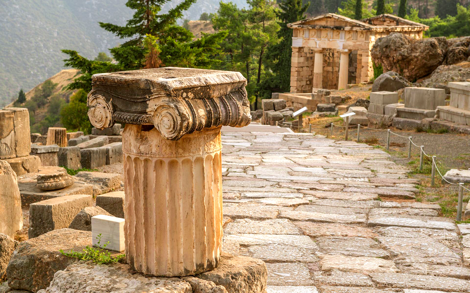 Ancient column and ruins at Delphi, Greece.