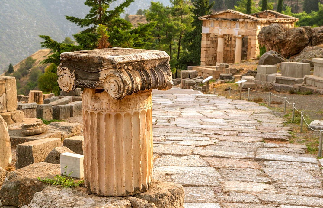Ancient column and ruins at Delphi, Greece.