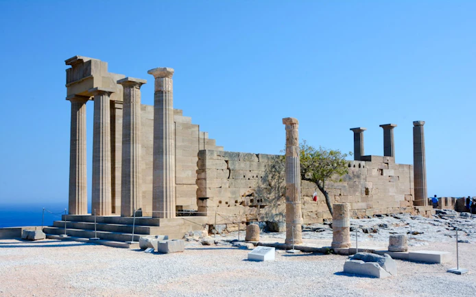 Acropolis of Lindos ruins with ancient columns in Greece.