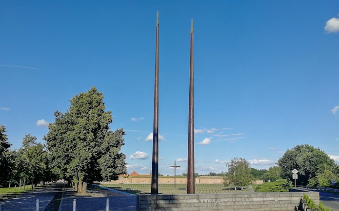 Terezin memorial with tall sculptures and trees in Litomerice district.