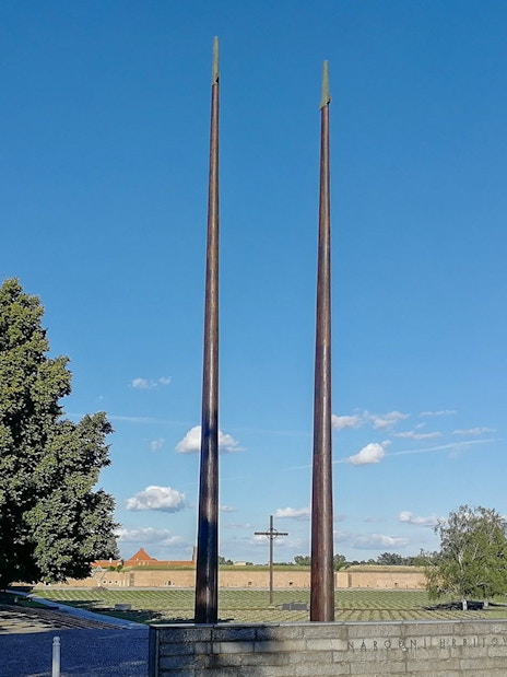 Terezin memorial with tall sculptures and trees in Litomerice district.