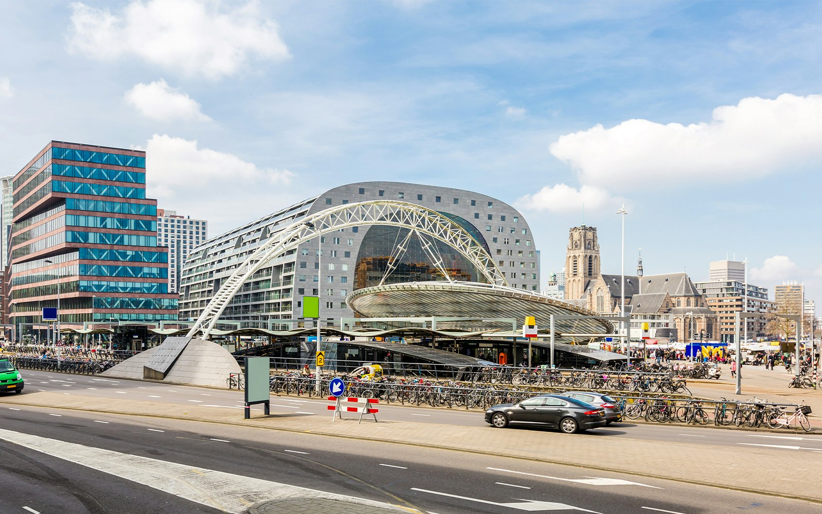 View of Rotterdam's Market Hall, a unique indoor food market and shopping center in the Netherlands, bustling with locals and tourists