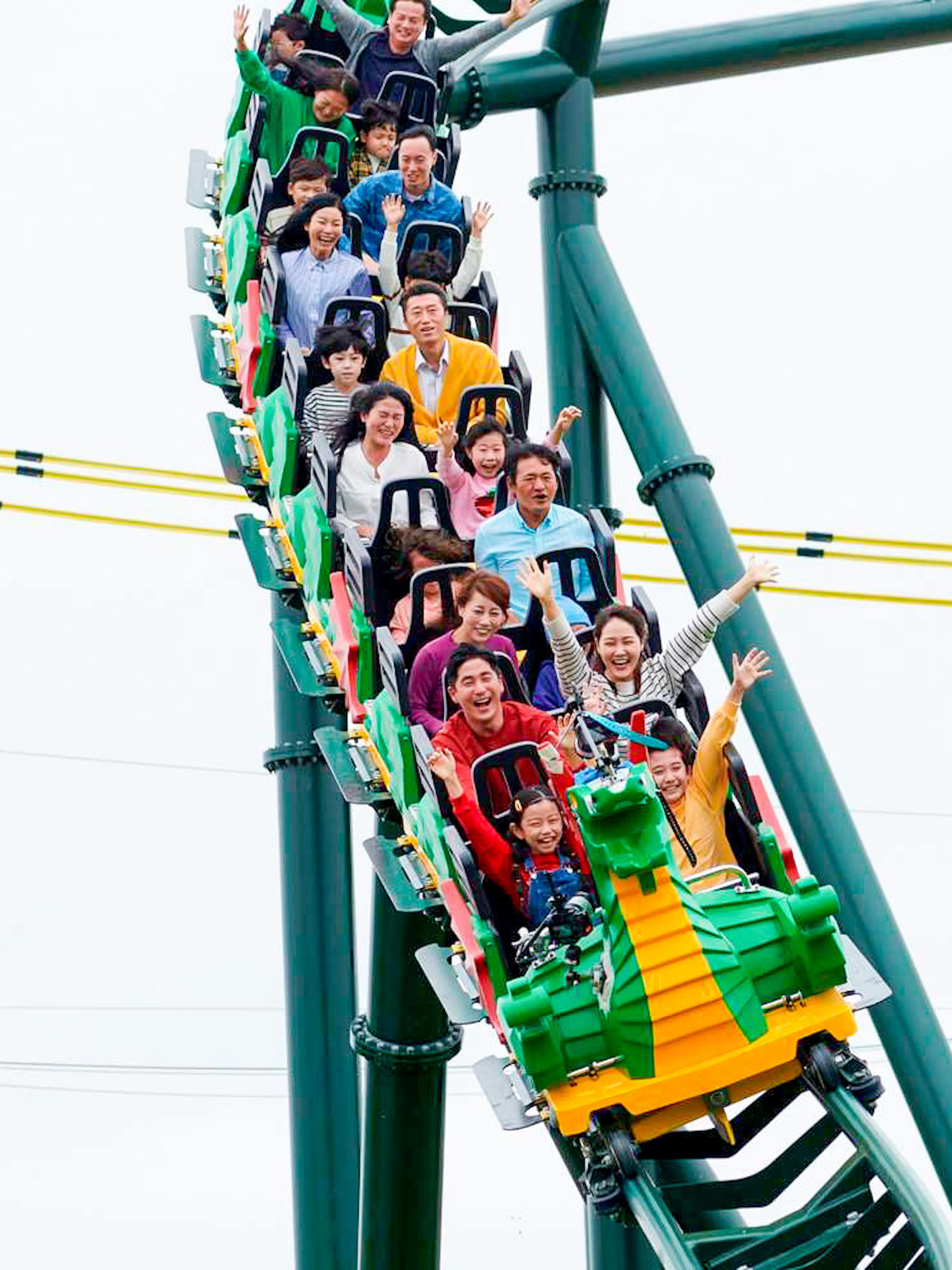 Visitors enjoying a roller coaster ride at LEGOLAND Korea.