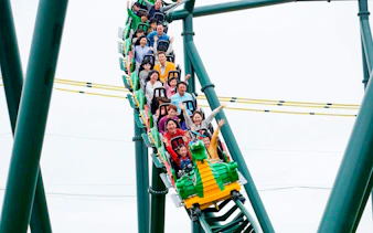 Visitors enjoying a roller coaster ride at LEGOLAND Korea.