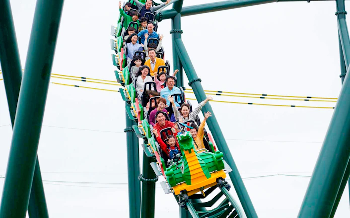Visitors enjoying a roller coaster ride at LEGOLAND Korea.