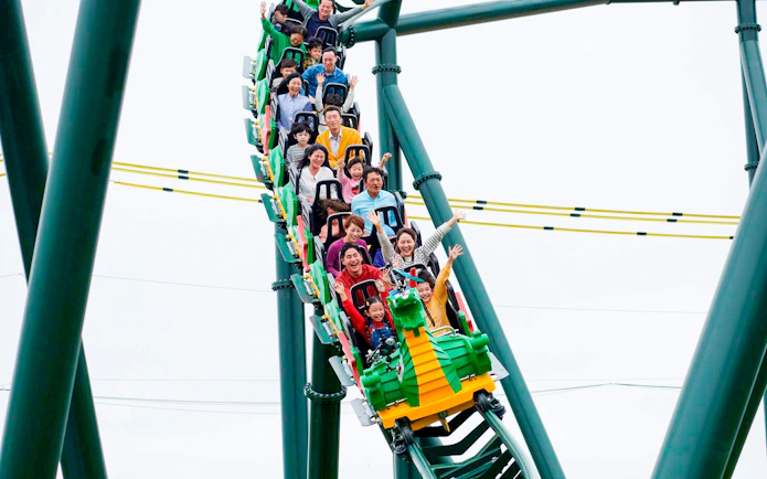 Visitors enjoying a roller coaster ride at LEGOLAND Korea.